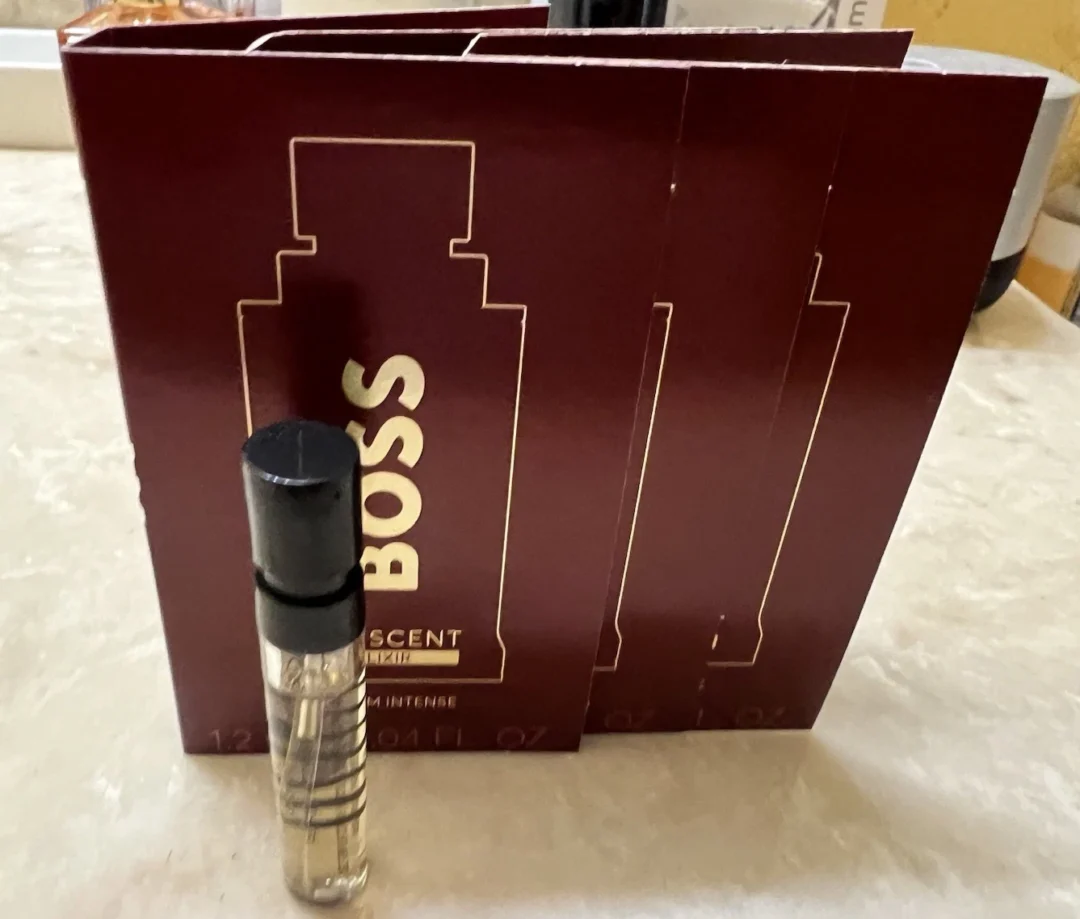 Boss perfume sample vial with burgundy packaging