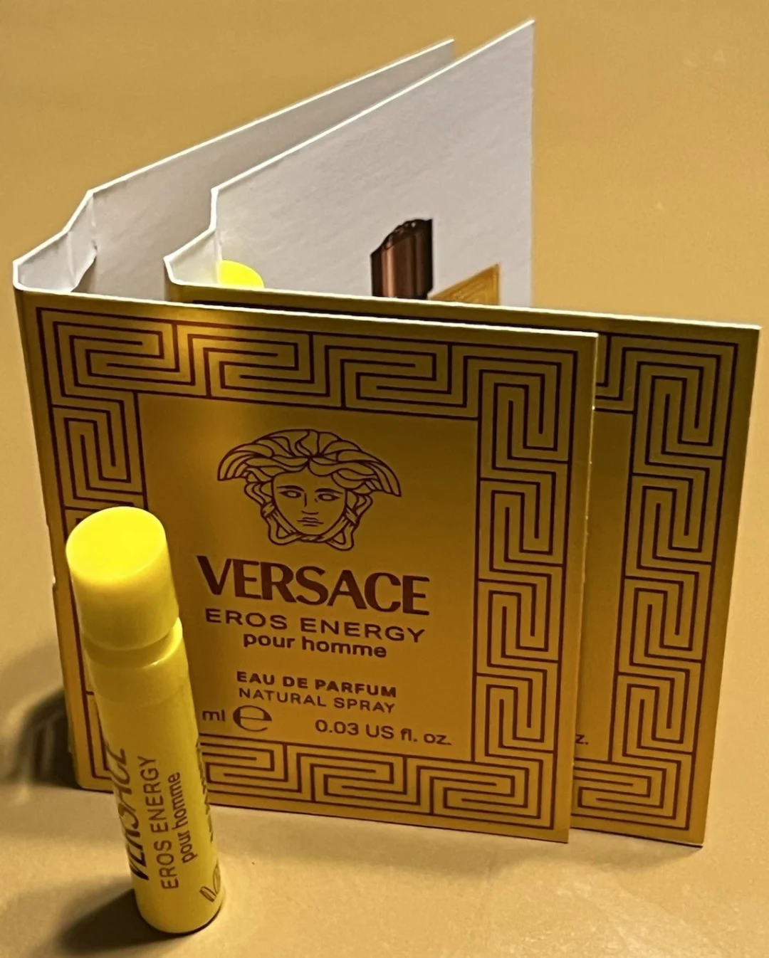 Versace Eros Energy perfume sample vial and booklet